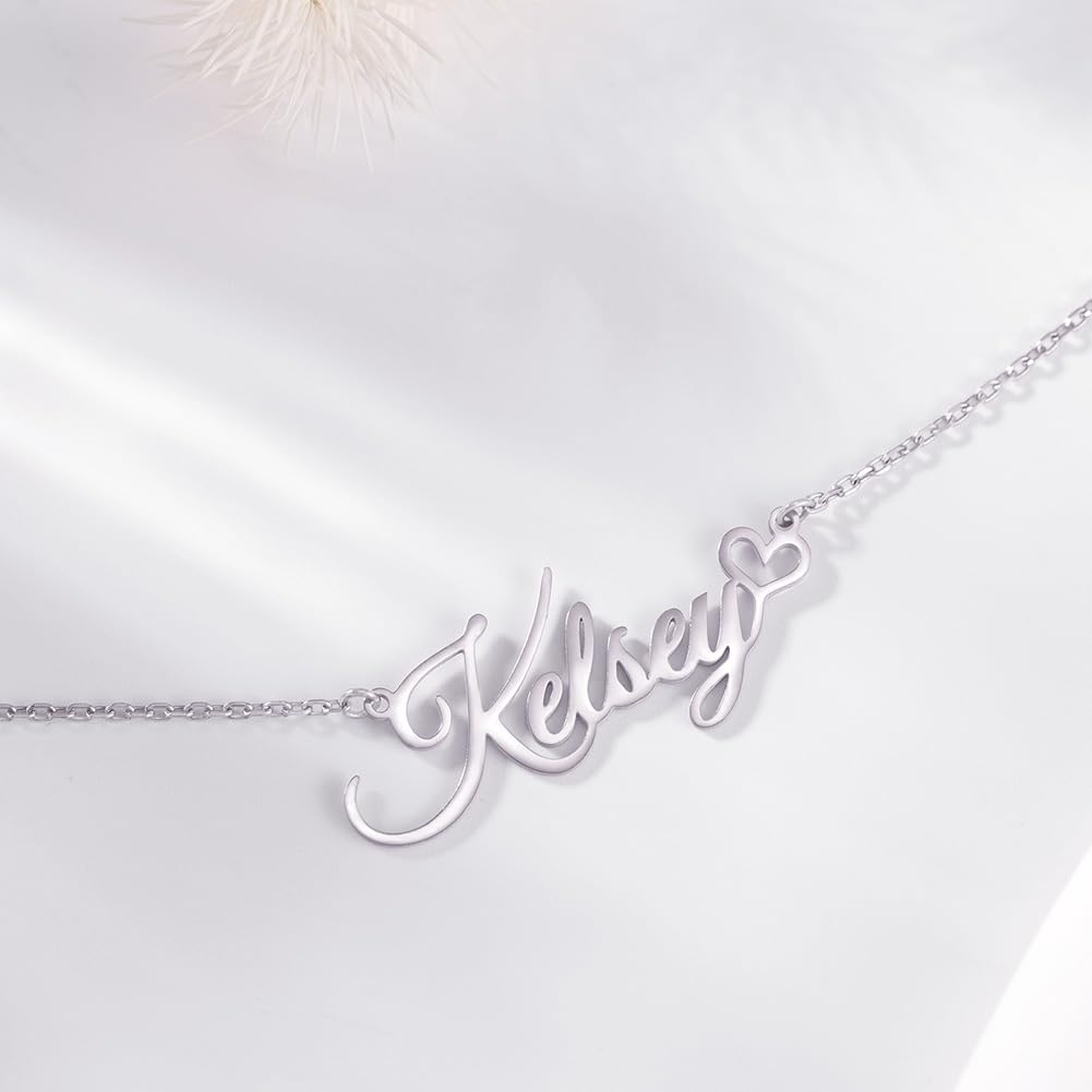 Check out this beautiful packaging—it’s almost too pretty to open! And now, the moment of truth; let’s see my name shining beautifully on this stunning piece.